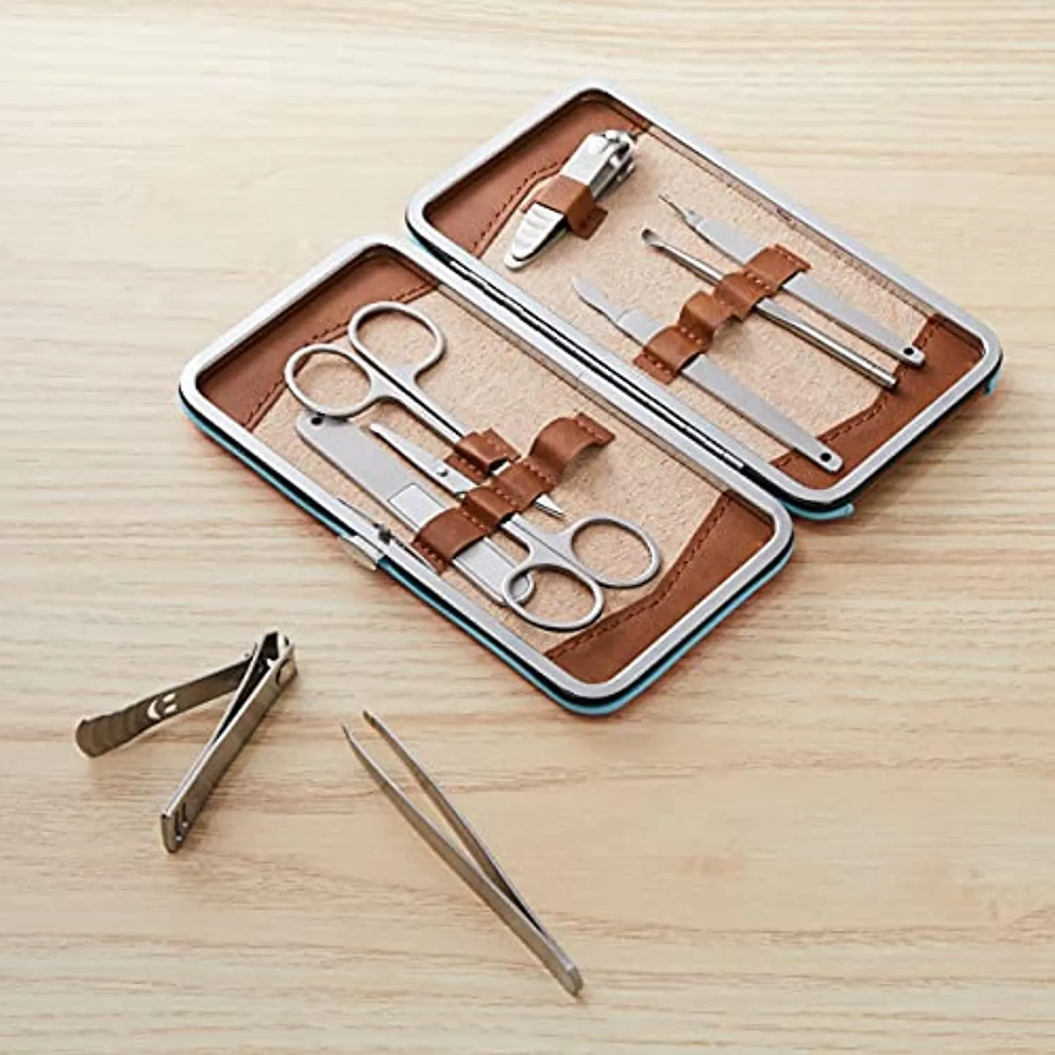 Amazon Basics 9-Piece Manicure and Pedicure Nail Clipping Set with Case- Stainless Steel, Turquoise