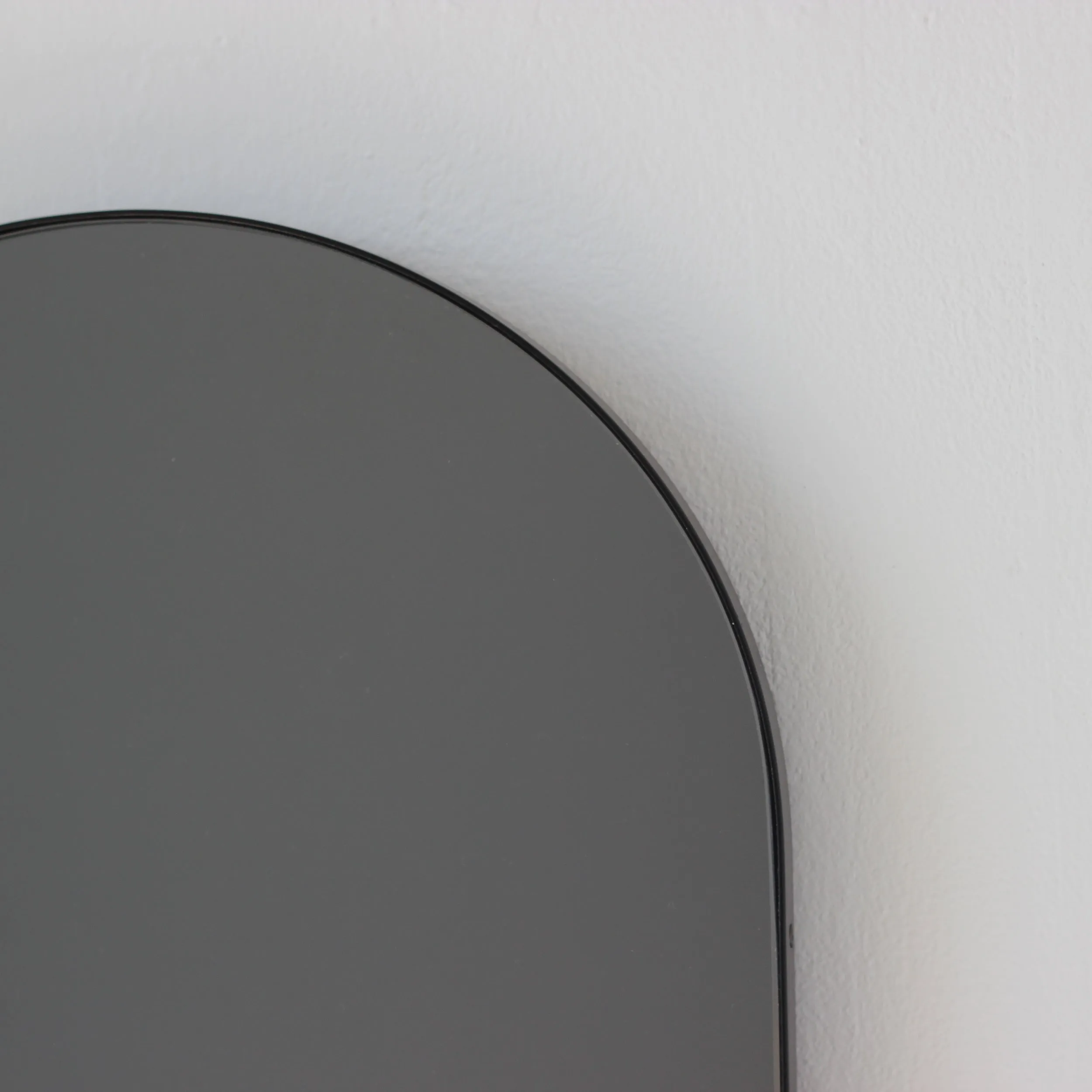 Arcus™ Arch shaped Black Tinted Contemporary Mirror with a Black Frame