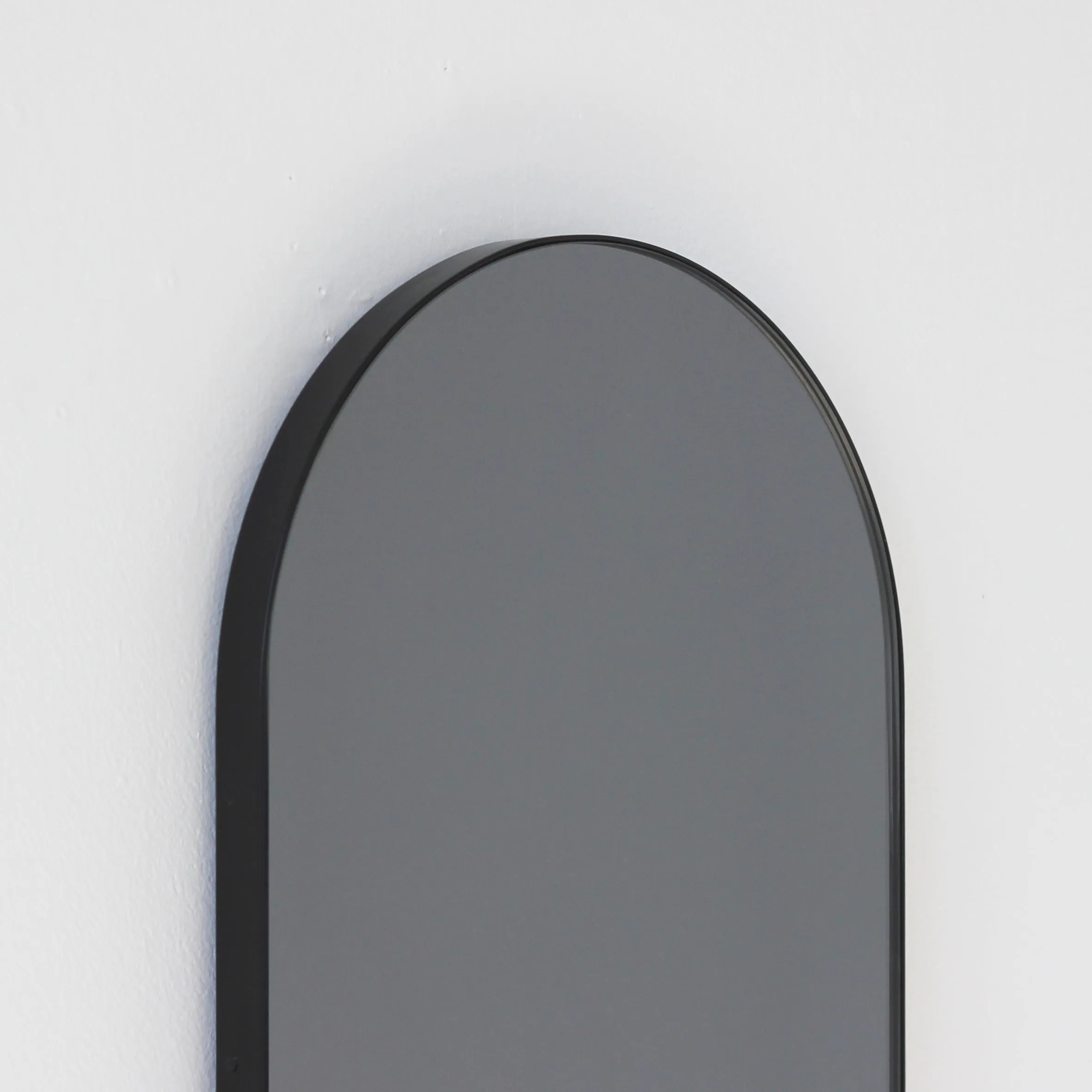 Arcus™ Arch shaped Black Tinted Contemporary Mirror with a Black Frame