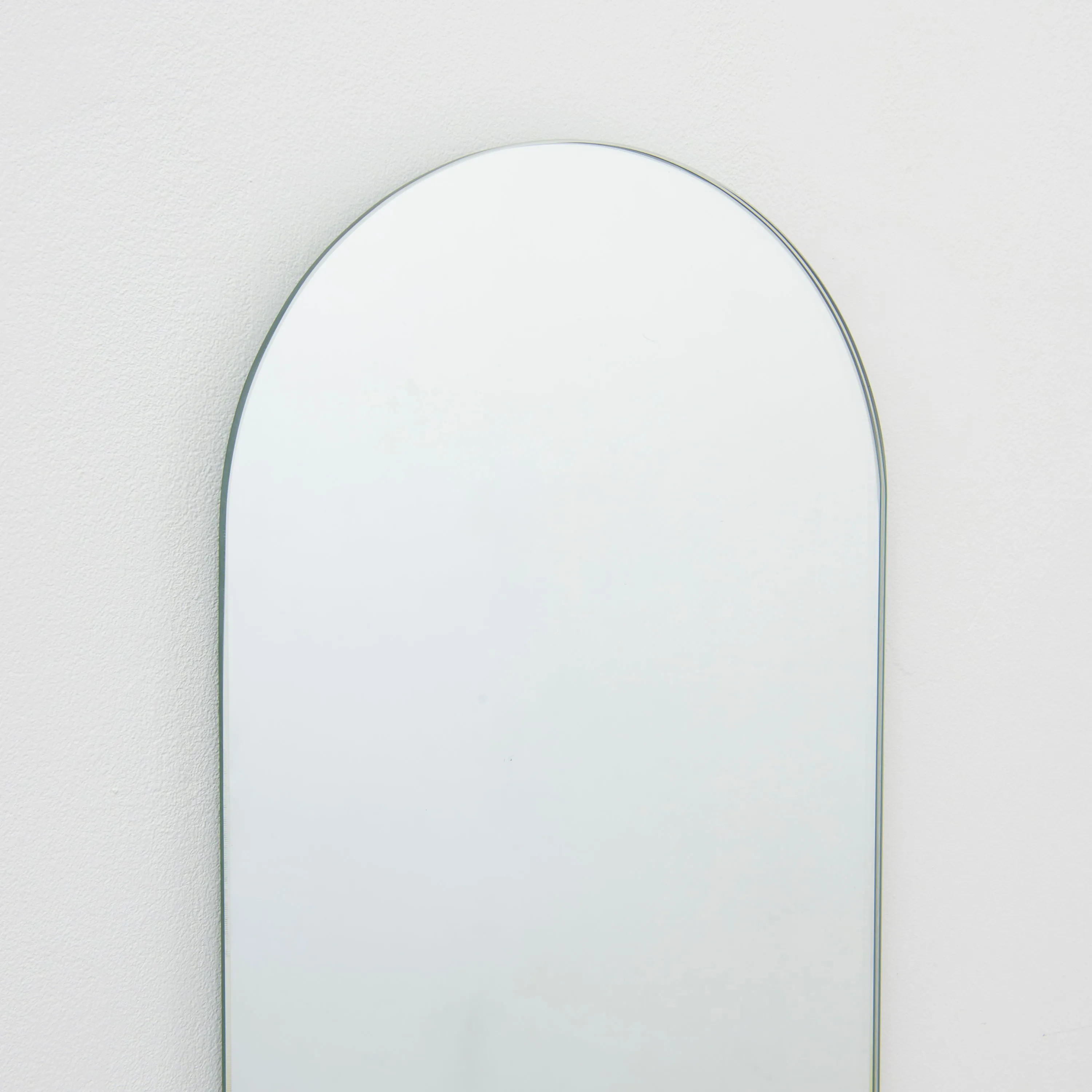 Arcus™ Arched Minimalist Frameless Mirror with a Floating Effect
