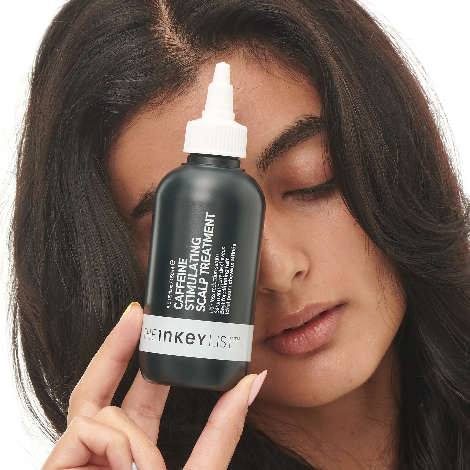 Caffeine stimulating scalp treatment