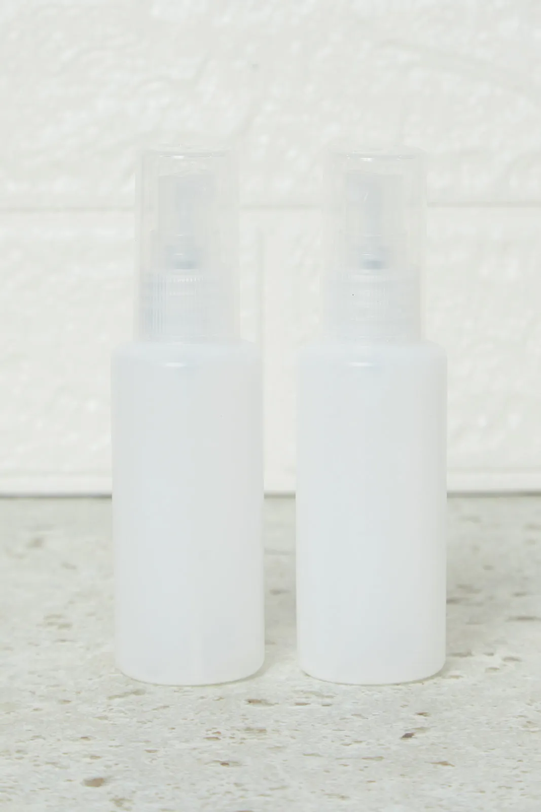 White Travel Bottle Set (4 Piece)