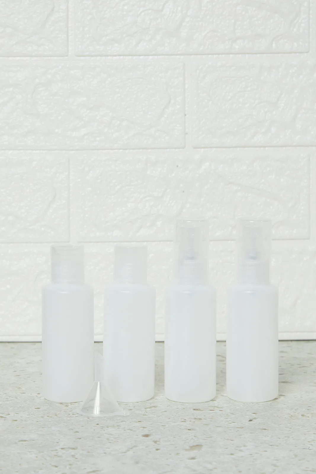 White Travel Bottle Set (4 Piece)
